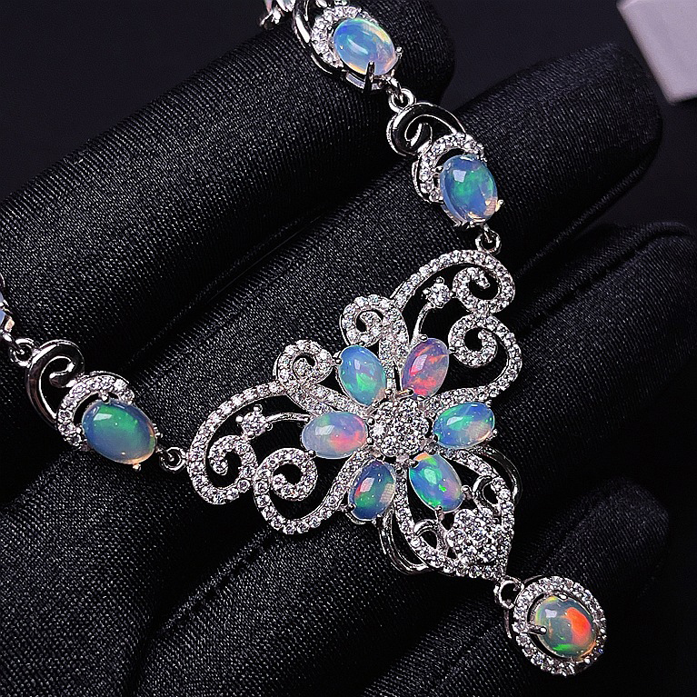 Genuine Ethiopian Opal and Lab Diamond Silver Teardrop Crossover Pendant Necklace